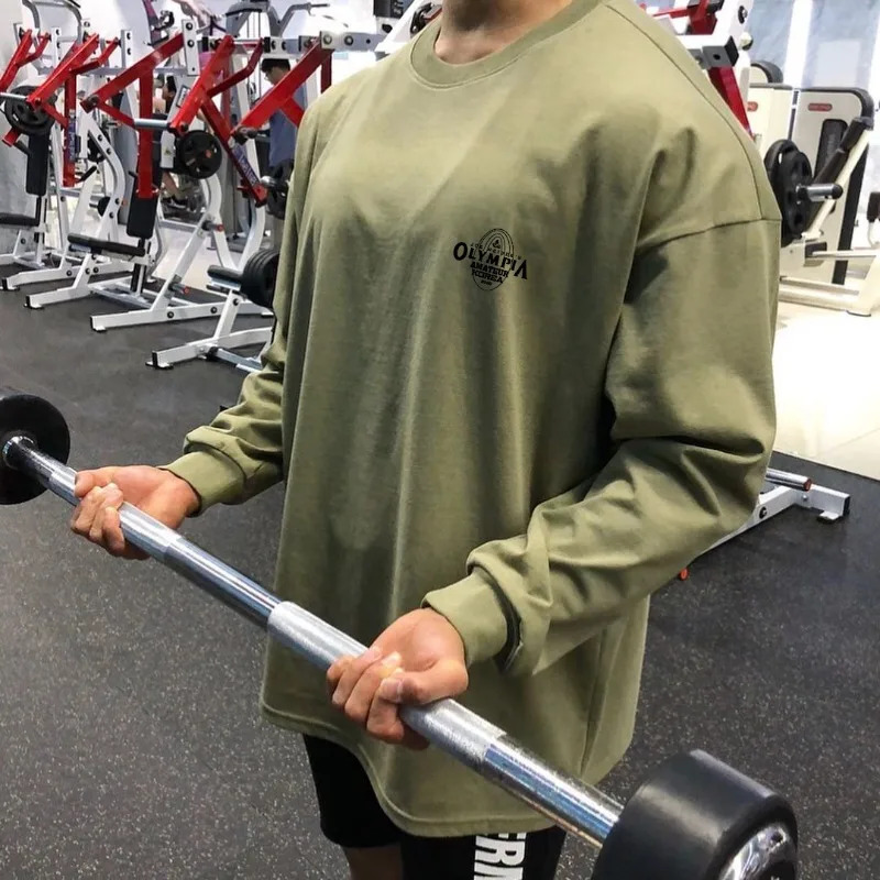 Erkaklar sport zali sport kiyimlari Moda erkaklar uchun bodibilding Fitness mashg'ulotlari Uzun yengli futbolkalar Yugurish kozoklari Kundalik futbolkalar tepalari
