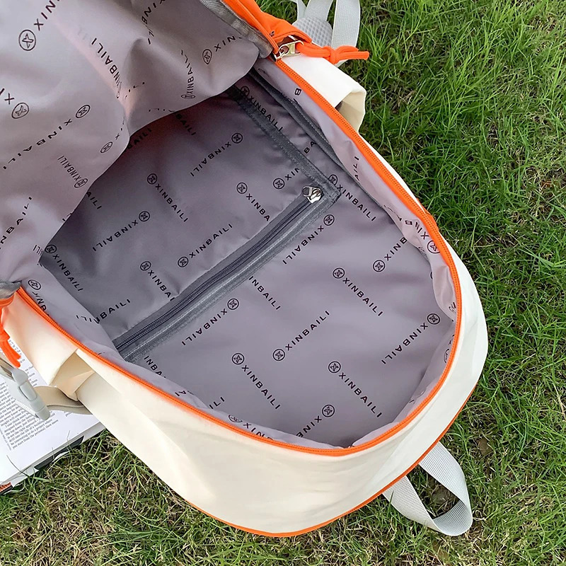 Moda Uniseks xalta yuqori sifatli elkama-sumkalar katta hajmli kompyuter sumkasi suv o'tkazmaydigan mato maktab sumkasi Yengil vaznli ayollar sumkalari
